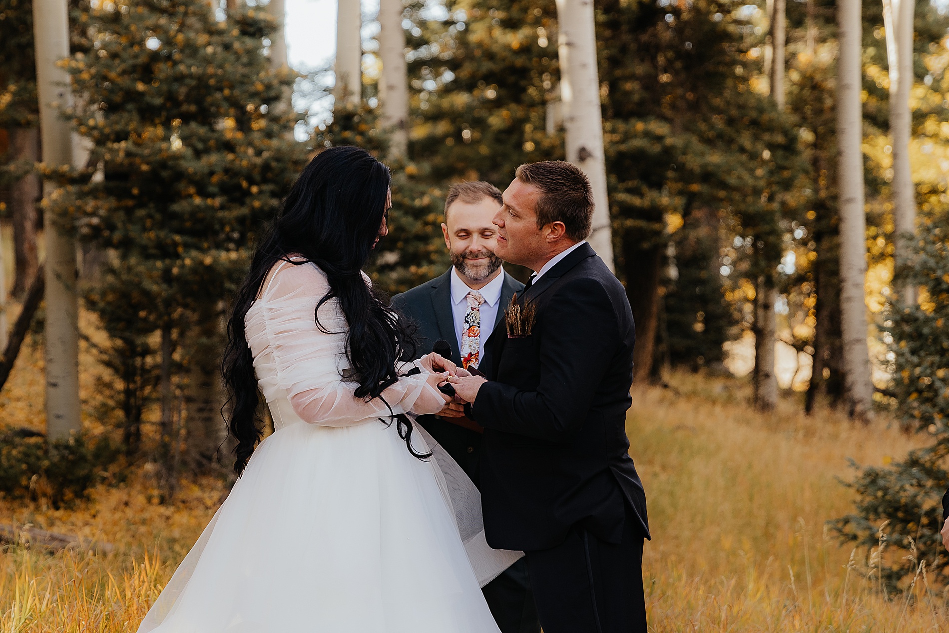 bride and groom exchange vows