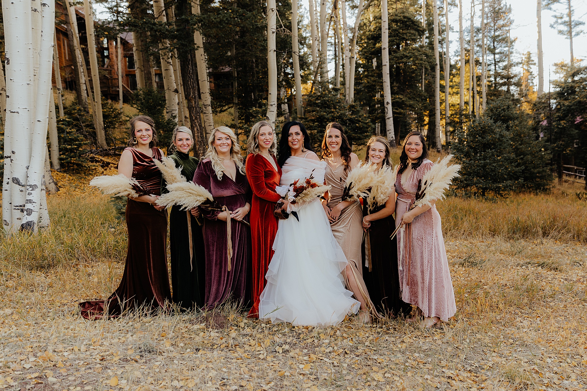 bride with bridesmaids in fall dresses