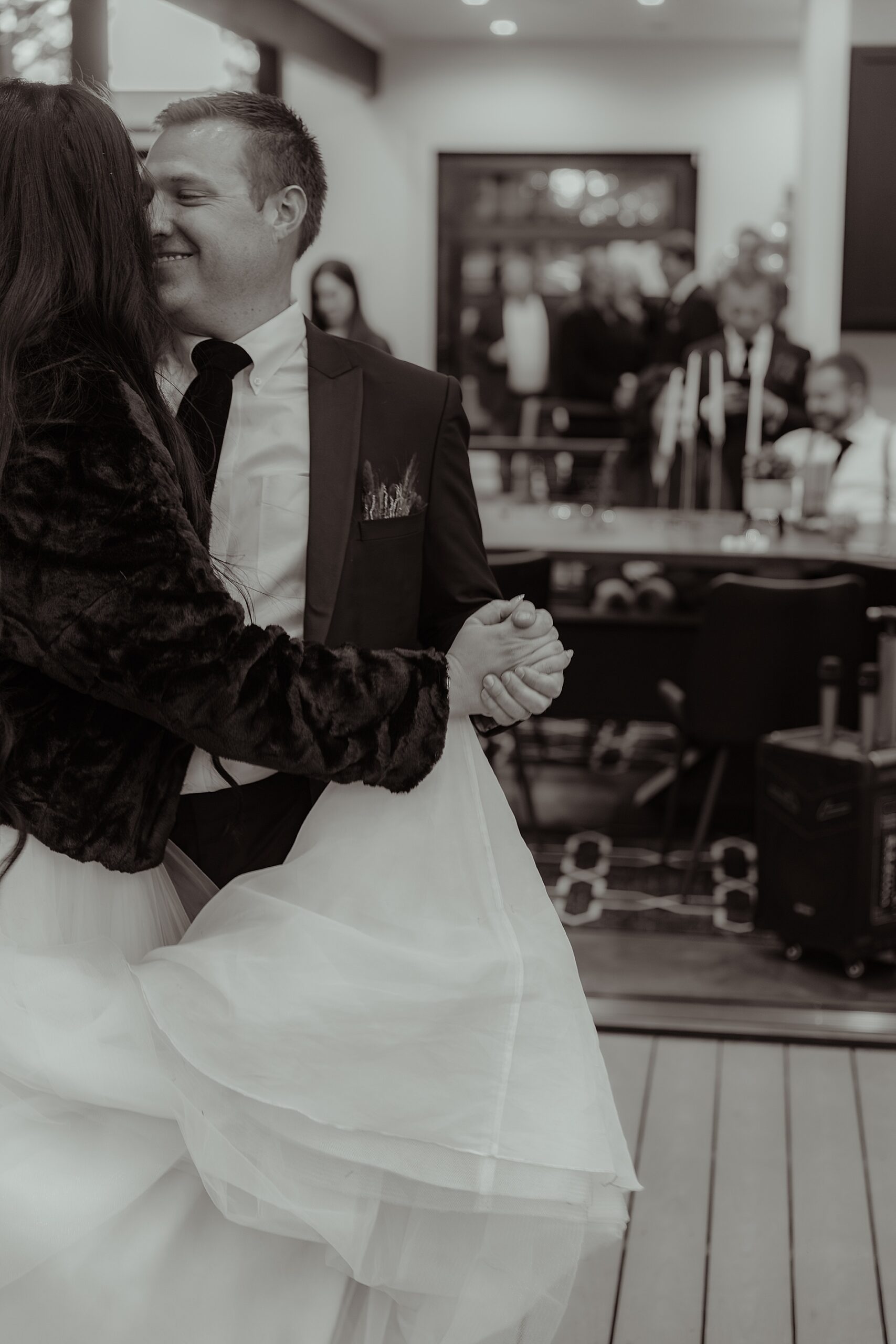 candid moment of newlyweds' first dance together