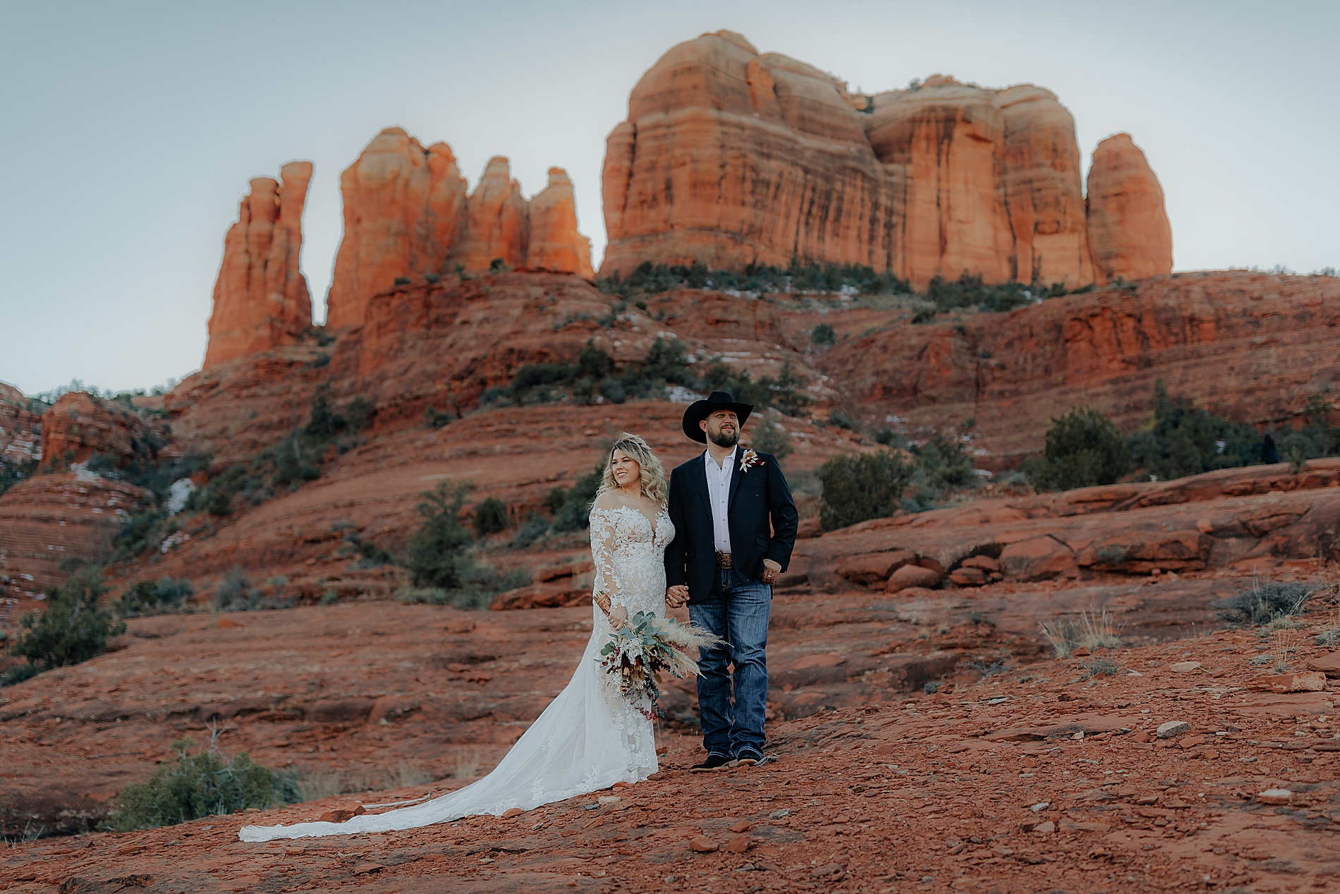 bride and groom at Cathedral Rock in Sedona AZ for intimate elopement 