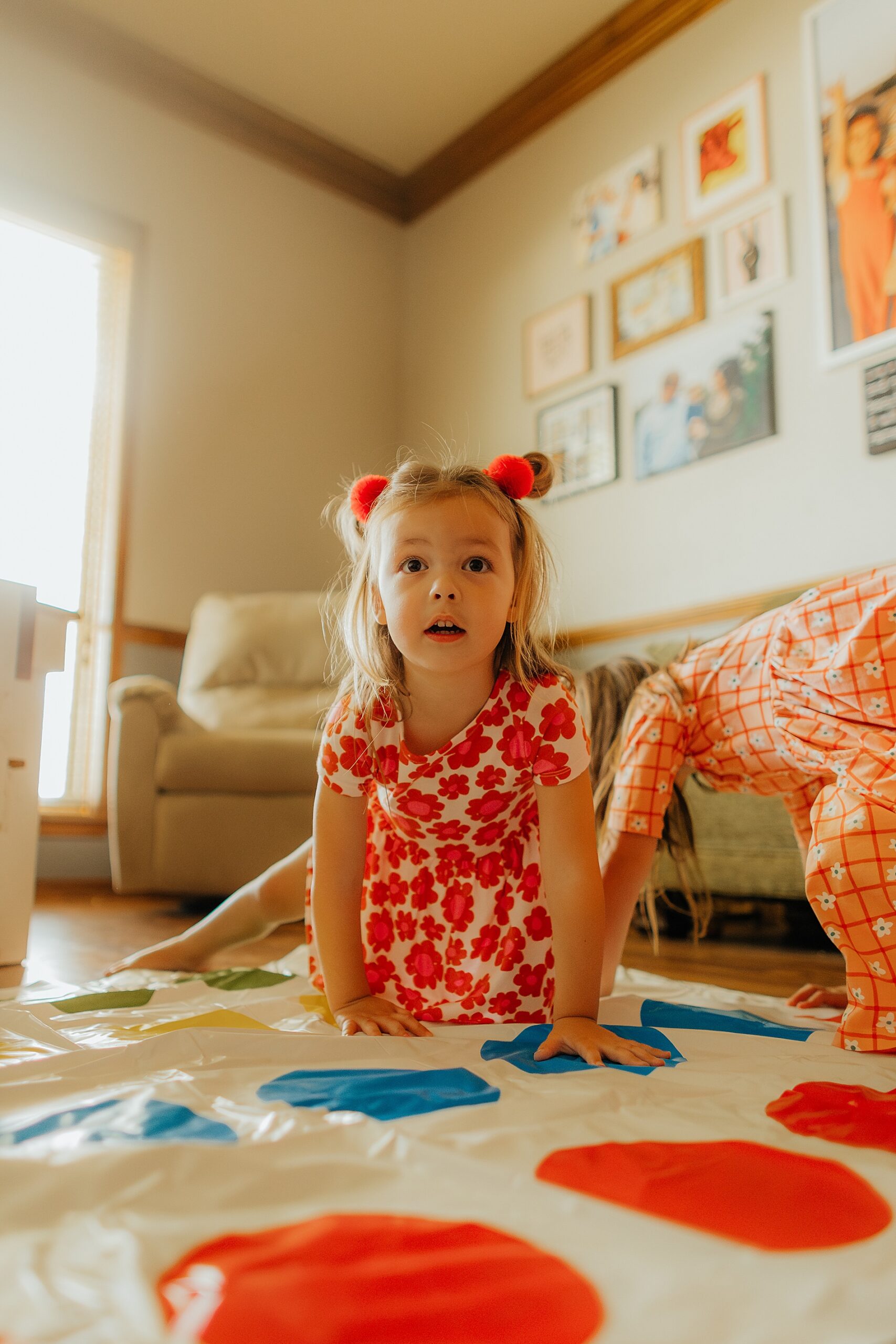 little girl playing twister